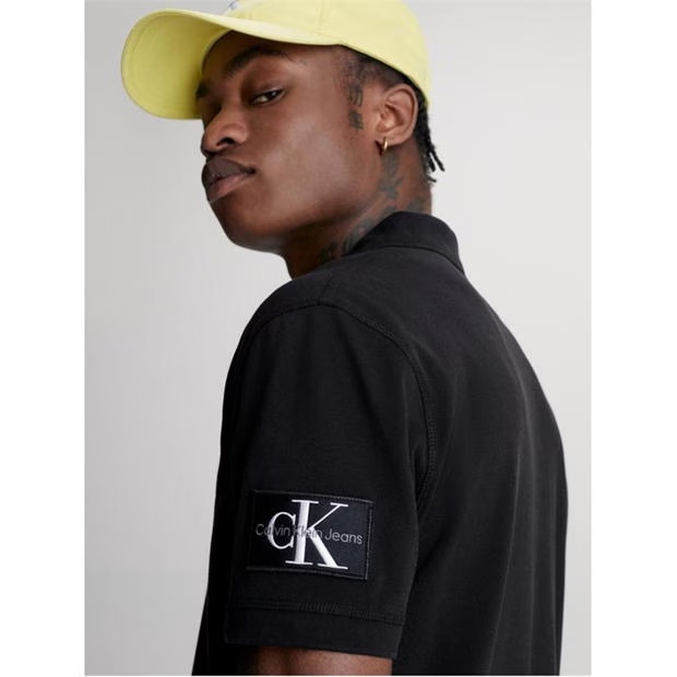173078-calvin-klein-jeans-badge-polo-1.jpg